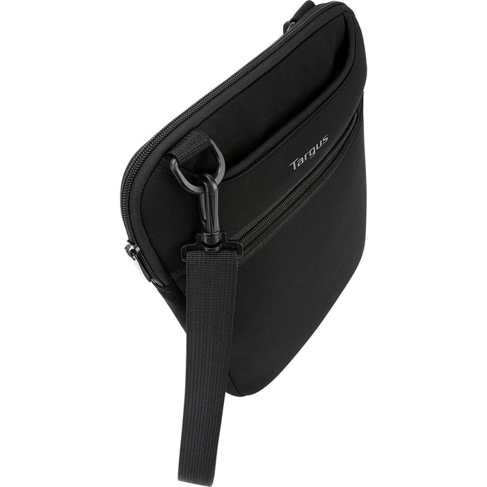 Black Targus 12-inch laptop slipcase, closed, with detachable shoulder strap and hideaway handle.