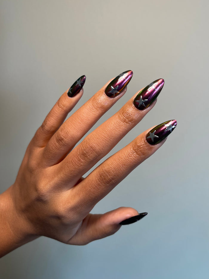 Silver stars on multichrome nails