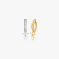 Butterfly Titanium Belly Button Ring (Single) features silver-tone and gold-tone huggie hoops with butterfly charms, adorned with clear stones, made from tarnish-resistant titanium.