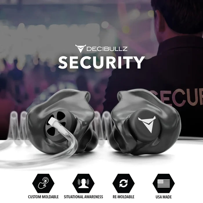 A promotional image for Decibullz Custom Moldable Surveillance Radio Headset Earpieces with Awareness showcases the earplugs with their logo clearly visible. A vigilant security guard stands in the background. Icons at the bottom highlight features: custom moldable earpieces, situational awareness, re-moldable, and USA made.