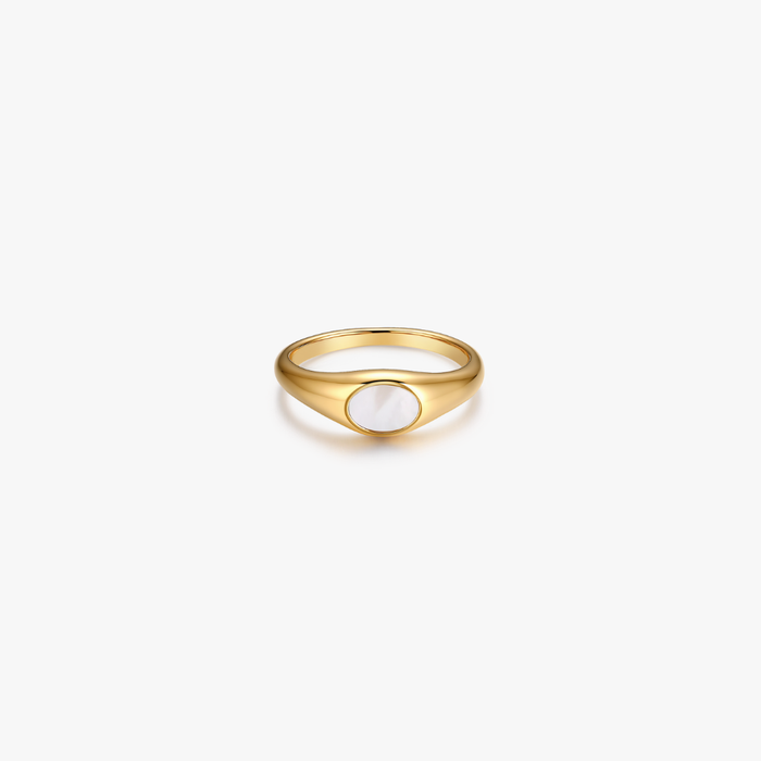 Denise Mother of Pearl Signet Ring features a polished yellow-gold band with a smooth, oval mother-of-pearl inlay, crafted from stainless steel and 18K PVD gold plating.