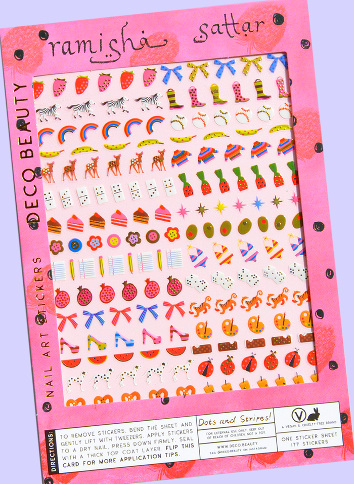 Dots & Stripes nail art sheet flat lay on purple background