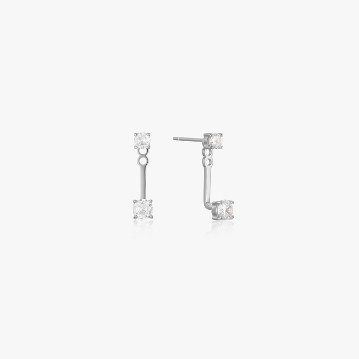 Double Gem Huggie Earrings: silver drop-style, featuring two clear faceted stones, gold-plated stainless steel, water-safe, tarnish-resistant, and suitable for sensitive skin.