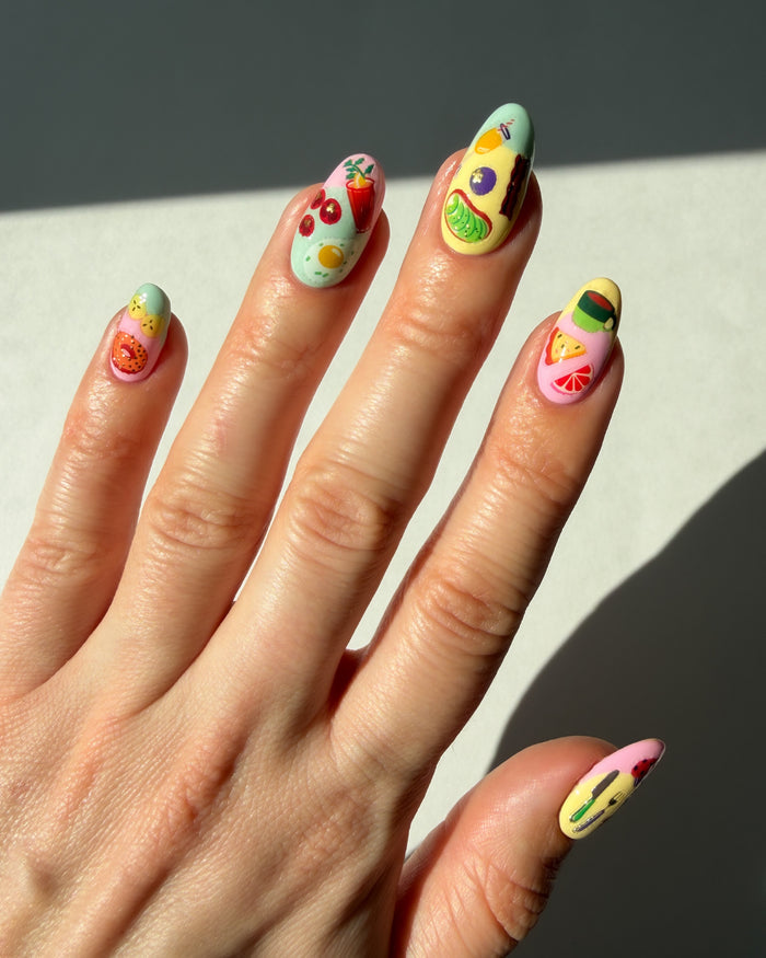 Food nail art stickers on pastel frenchie nails