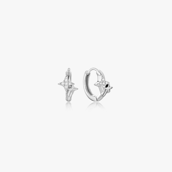 Estelle Double Star Mini Hoops: Small silver-tone earrings with star motifs encrusted with clear crystals, designed in stainless steel, water safe and tarnish resistant.