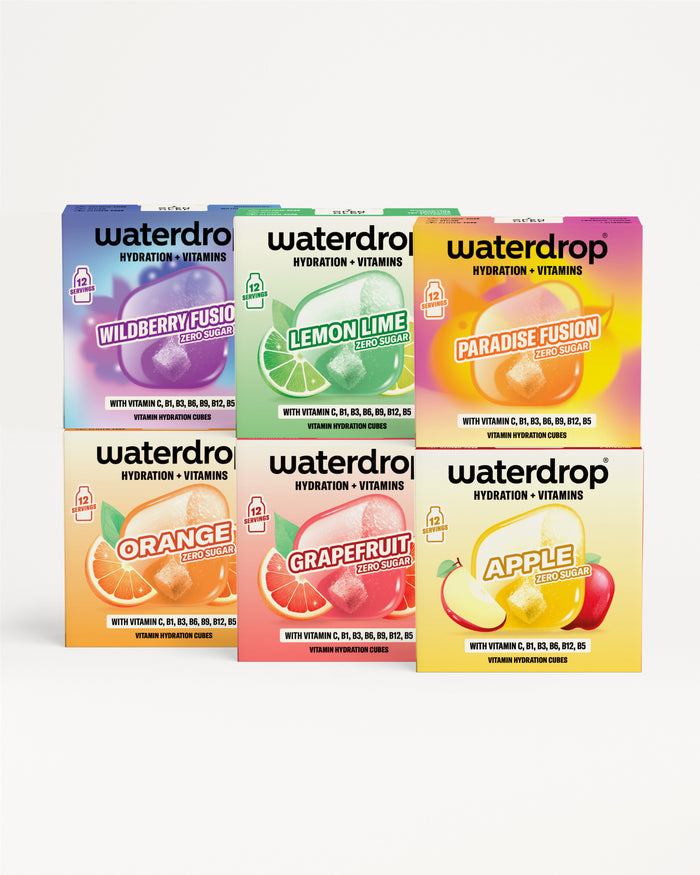 Šest balení Waterdrop pro hydrataci a vitamíny v různě barevných obalech, uspořádaných do dvou řad.