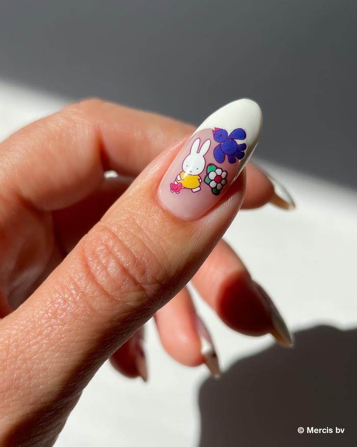 Nail with french tip and miffy nail art stickers