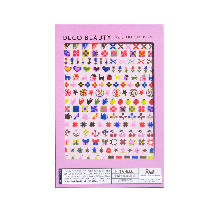 Pinwheel nail art sheet flat lay on a white background