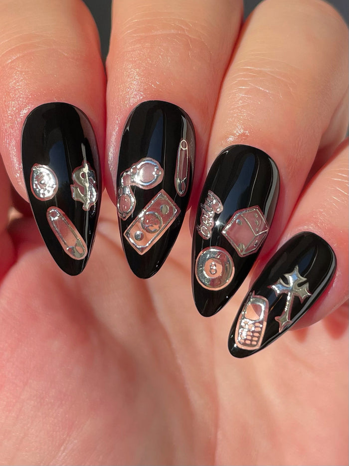 Black nails with silver stickers
