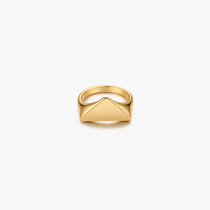 Sable Triangle Signet Ring featuring a polished triangular-topped face, crafted from stainless steel with 18K gold plating, designed to be water safe and tarnish resistant.