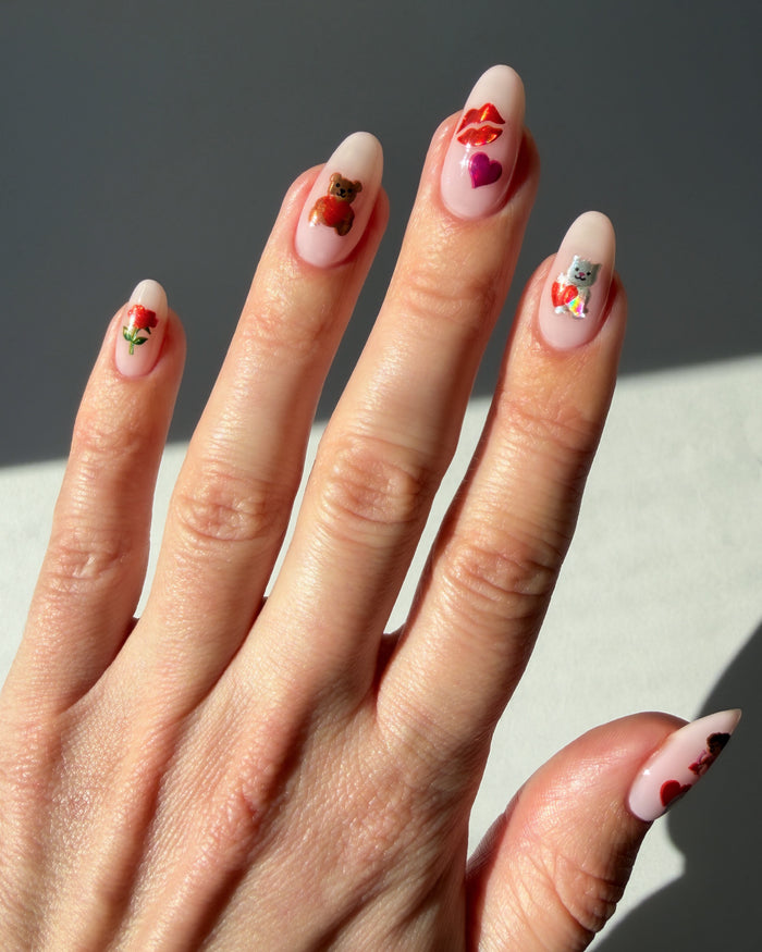 Teddy Bear stickers on nude nails