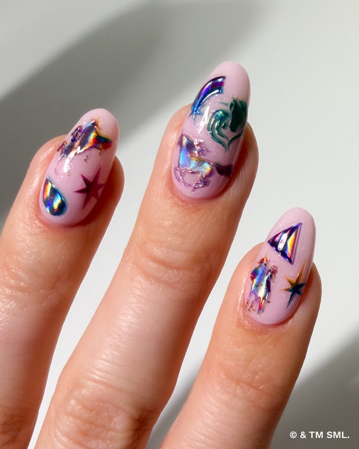 Nails with colorful designs on a light background